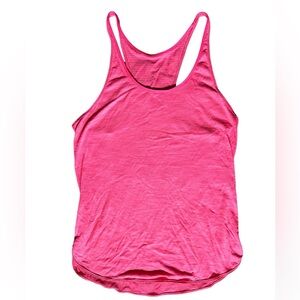 Lululemon bright coral used loose tank. Size 10 with tags removed.